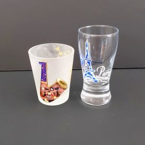 Set of 2 shot glasses from Paris and New Orleans